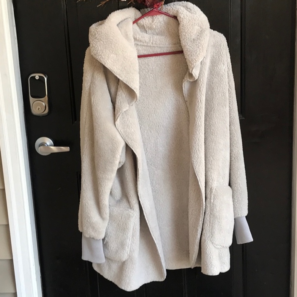NWOT beige furry hoodie. In perfect condition!